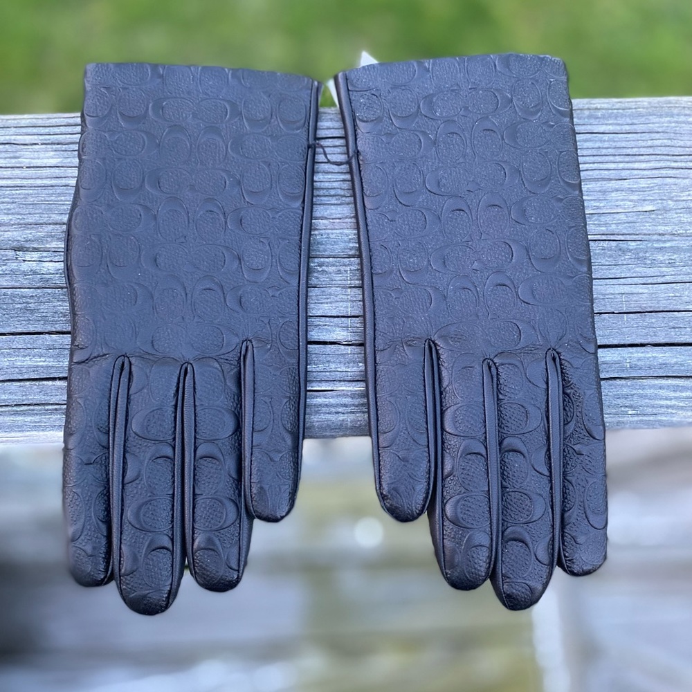 Black leather coach gloves
